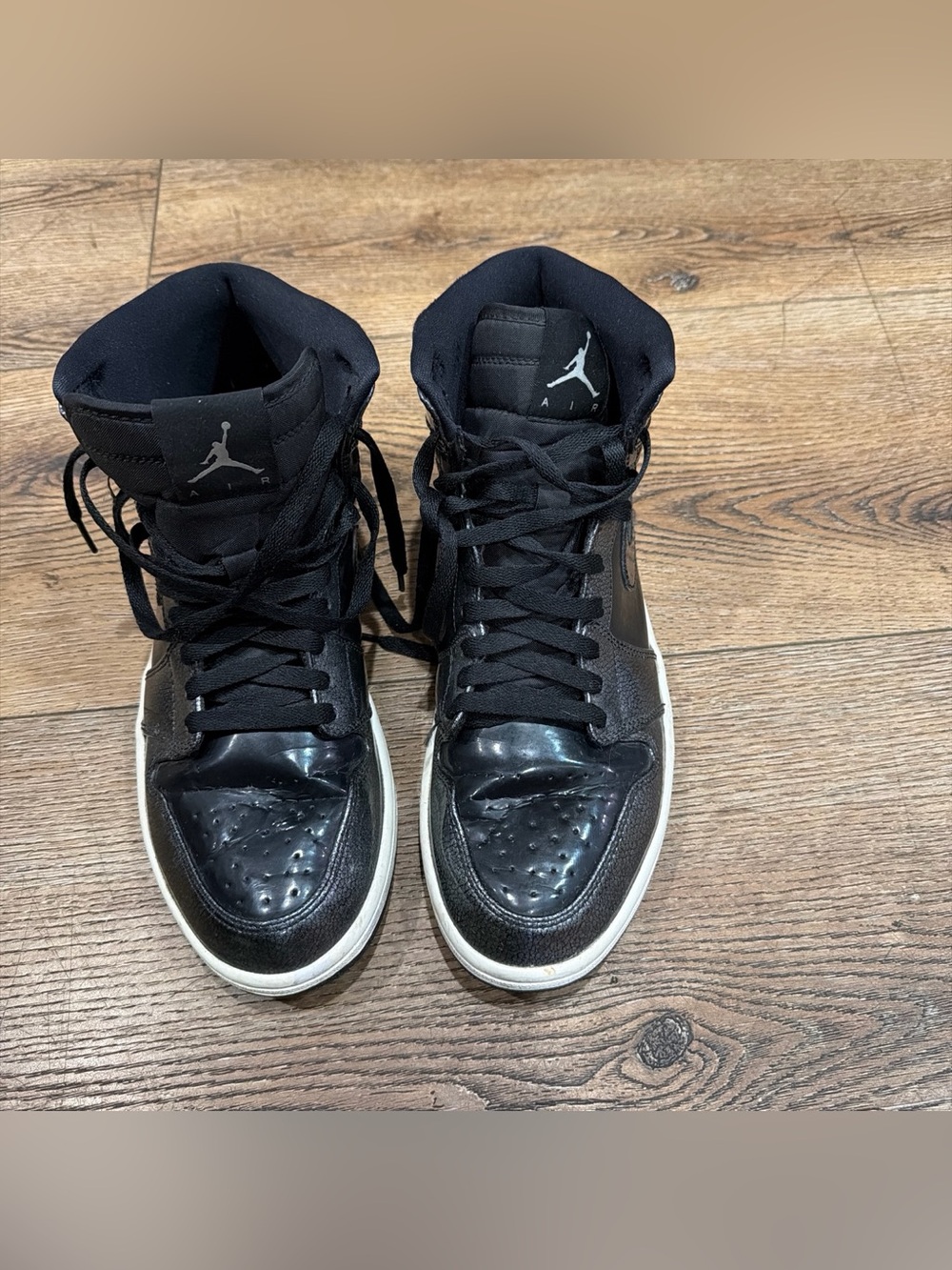 Jordan Men’s Black and White High-Top Sneakers